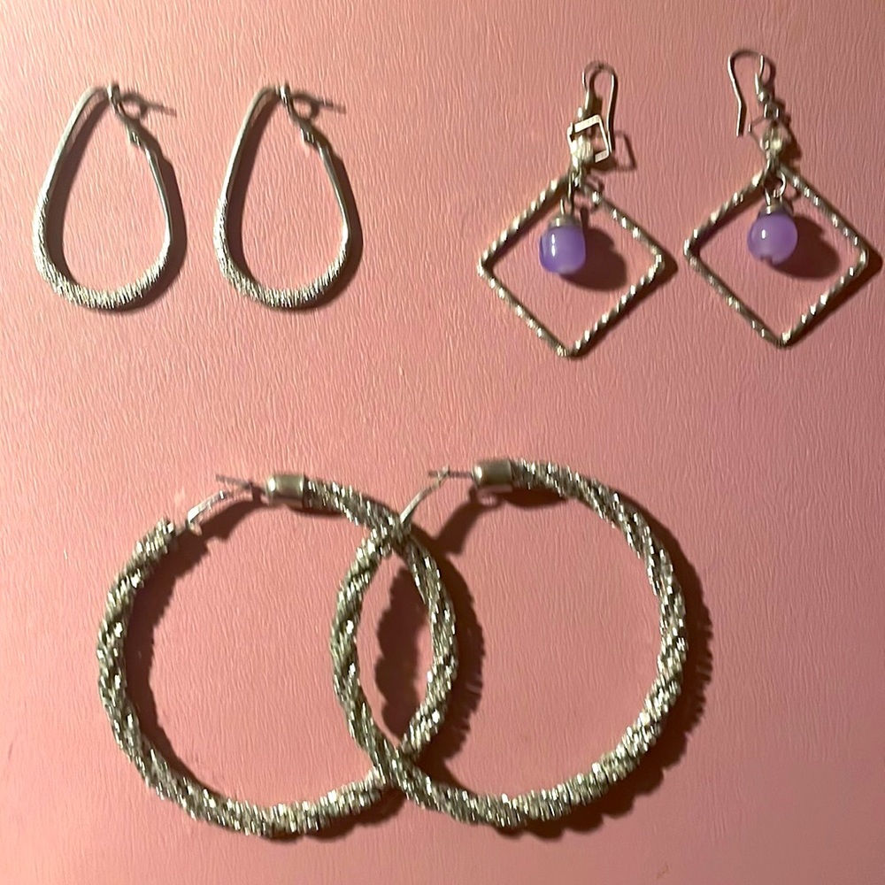 NEVER worn, 3 pairs of good quality SILVER. Beautiful costume jewelry.